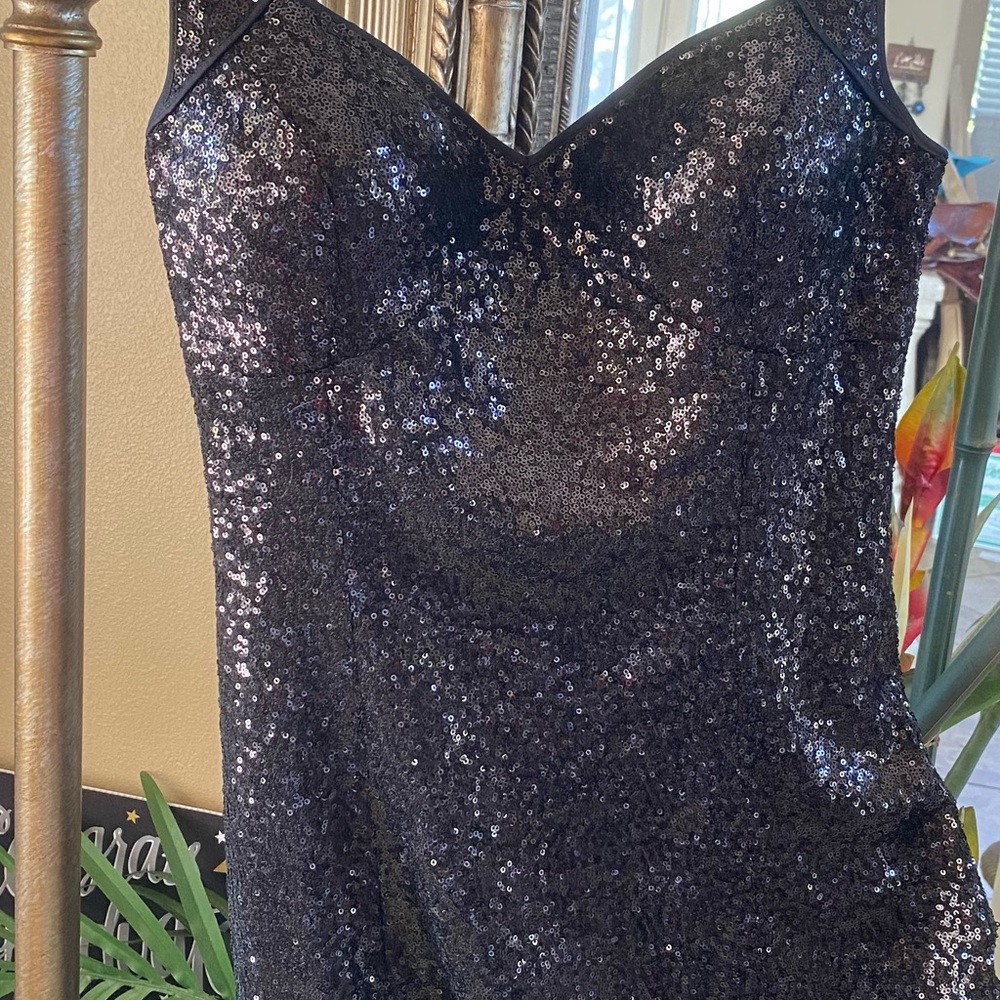 Black sequined evening sequined above knee dress